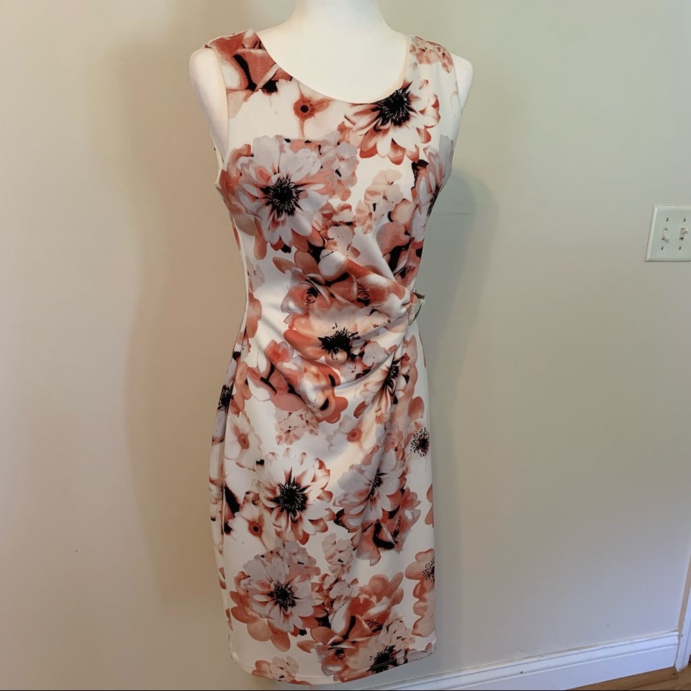 White and pink multi colored dress. floral print.